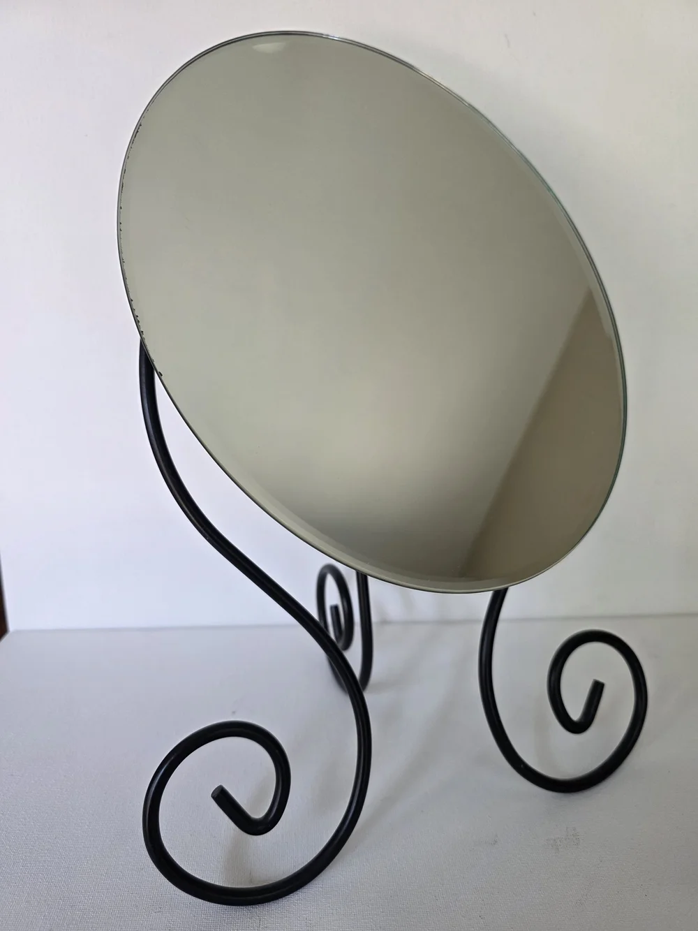 Vintage 1999 Myken Round Vanity Mirror with Black Scroll Frame
